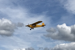 Mark’s Piper Cub with pretty clouds as a backdrop
