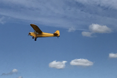 Mark’s Piper Cub in blue sky