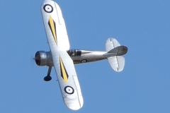 Les Crane maidens his Gloster Gladiator. Built from the Brian Taylor plan ( www.sarikhobbies.com ), model is 56” wingspan. Motor is a 4Max 360kV, 80amp ESC, prop is 17 x 10 and battery is 5s 4500. Decals from Callie Graphics depict the Shuttleworth Collection Gladiator. Flies well.  Photo Grahame Pearson.