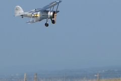 Les Crane maidens his Gloster Gladiator. Built from the Brian Taylor plan ( www.sarikhobbies.com ), model is 56” wingspan. Motor is a 4Max 360kV, 80amp ESC, prop is 17 x 10 and battery is 5s 4500. Decals from Callie Graphics depict the Shuttleworth Collection Gladiator. Flies well.  Photo Grahame Pearson.