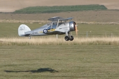 Les Crane maidens his Gloster Gladiator. Built from the Brian Taylor plan ( www.sarikhobbies.com ), model is 56” wingspan. Motor is a 4Max 360kV, 80amp ESC, prop is 17 x 10 and battery is 5s 4500. Decals from Callie Graphics depict the Shuttleworth Collection Gladiator. Flies well.  Photo Grahame Pearson.